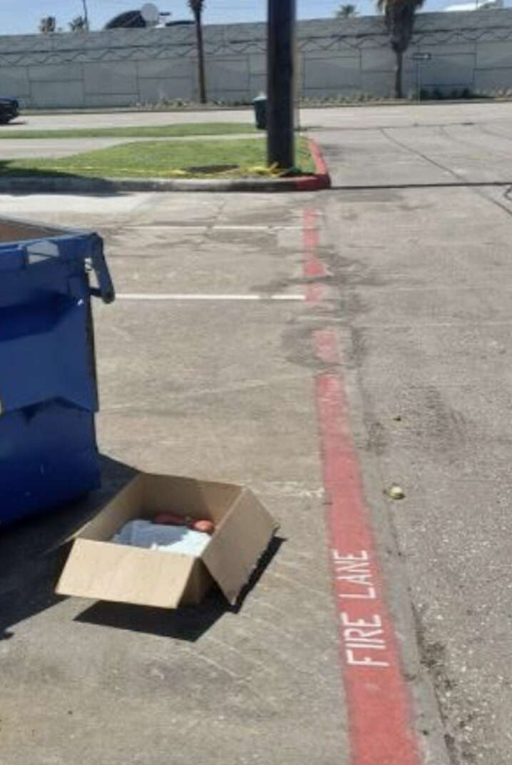 box next to dumpster