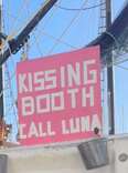 Tourists See Kissing Booth Sign On Boat — Then Sweet Face Appears In Porthole
