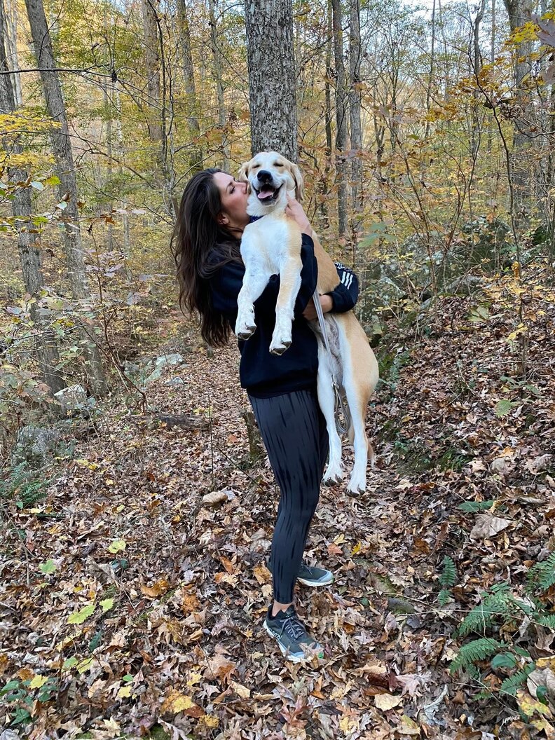 dog hiking with rescuer