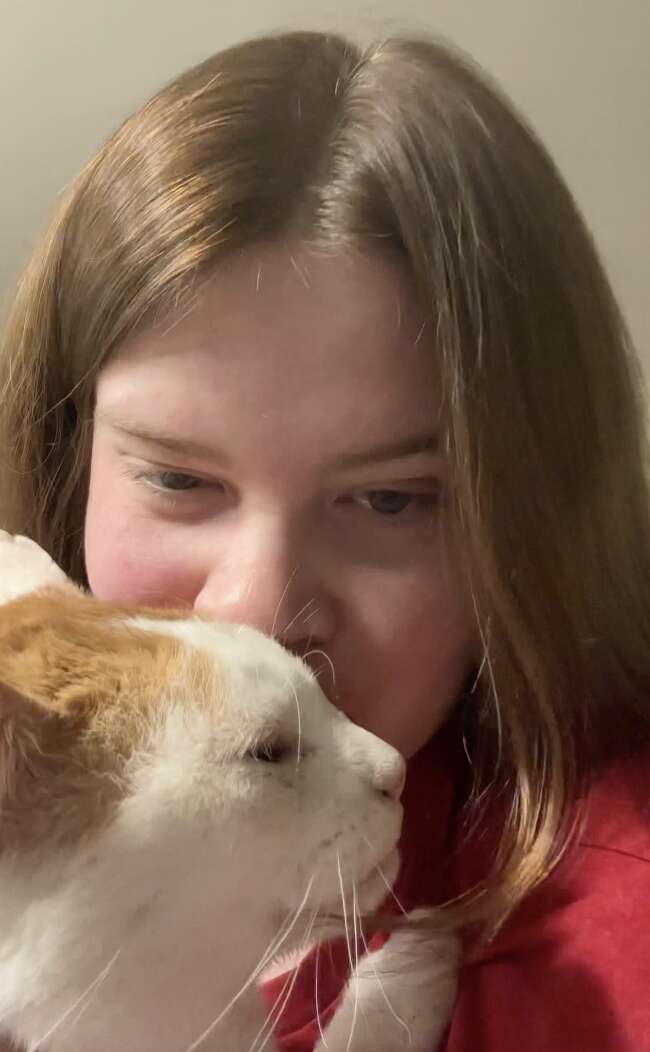 Mr. Wash lovingly headbutting