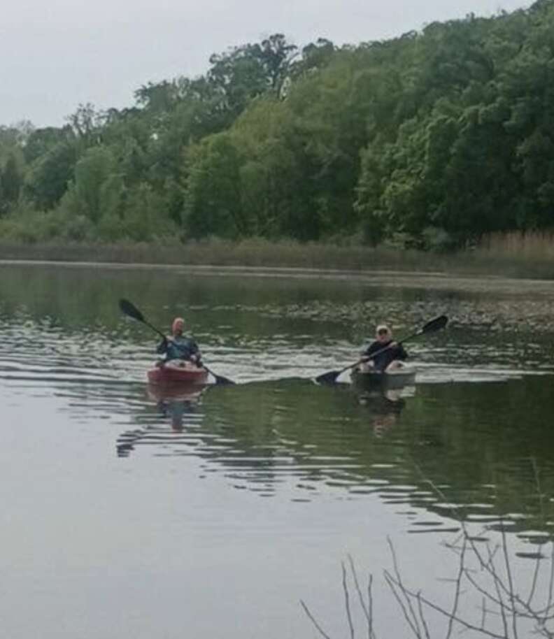 people kayaking on lake