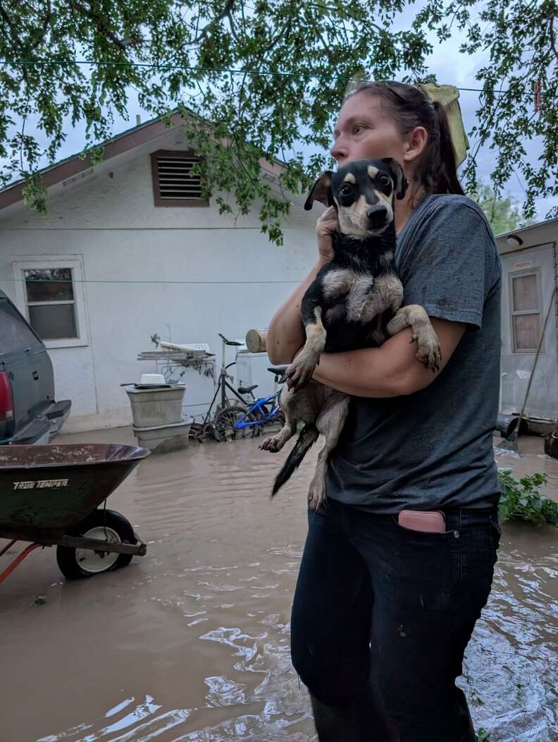 APA rescuers in the flooded neighborhood