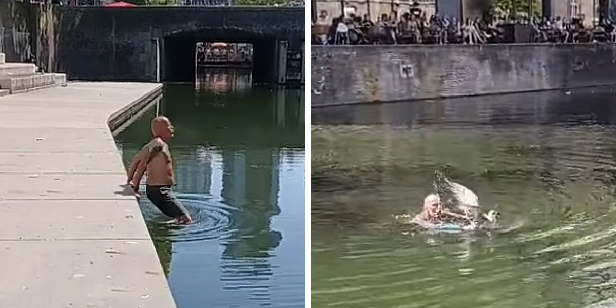 Crowd Watches As Man Leaps Into Canal To Rescue A Trapped Bird