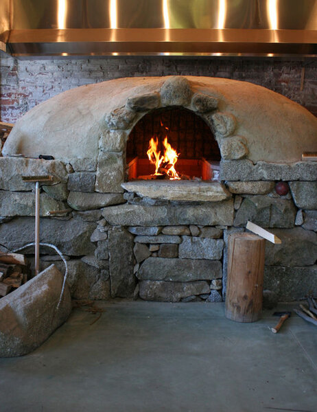 Neighborhood icon reopens serving wood-fire pizza - Thrillist