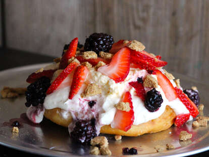 Gourdough's Public House-Austin-Donut w/ cheesecake filling, blackberries, and strawberries