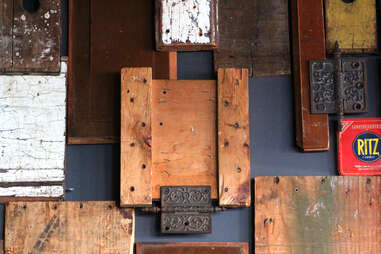 The wood paneling inside Cedar Point Bar & Kitchen includes this block resembling a Ritz Cracker box