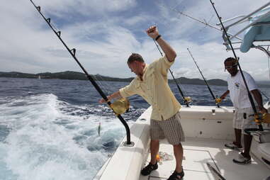 Man deep sea fishing 