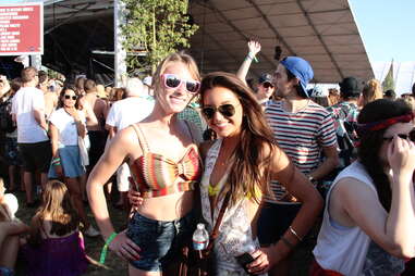 Two girls pose at Coachella 2013