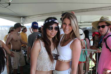 Two girls pose at Coachella 2013