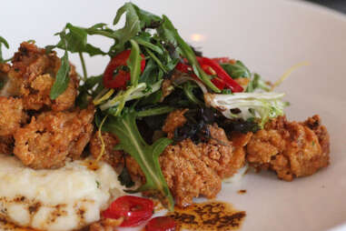 creole-buttered fried oysters at 21C Museum Hotel's Proof on Main restaurant