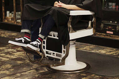 Guy in barber chair in socks from SockFancy