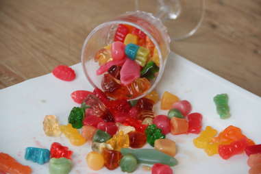 A cup exploding with vodka gummies