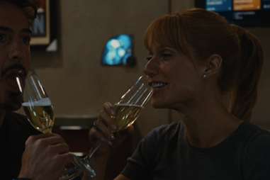 Tony Stark and Pepper Potts drink champagne in Iron Man 2. 