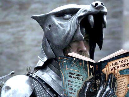 The Hound from Game of Thrones reads a History of Weapons