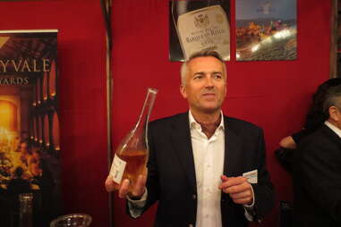 Holding rose at Wine Enthusiast's 25th