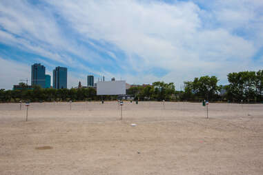 Parking in front of a screen at Coyote Drive-In, Fort Worth, Texas