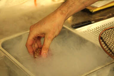 Dropping the sous-vide patties in the liquid nitrogen at Morgan's Pier