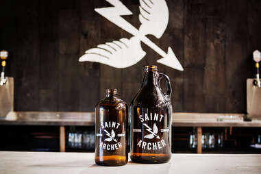 Growlers ready to be filled at Saint Archer Brewery in San Diego.