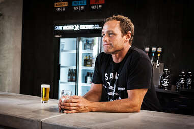 Pro surfer Taylor Knox enjoying a beer at Saint Archer Brewery.