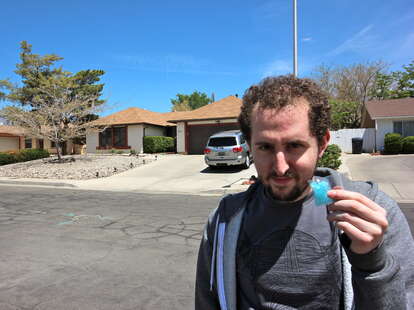 guy standing in front of Walter White's house from Breaking Bad