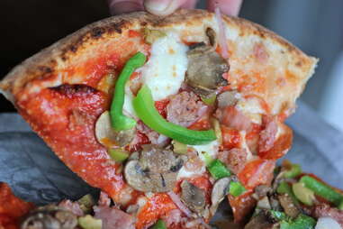 Supreme pizza at Pizzeria Locale Boulder