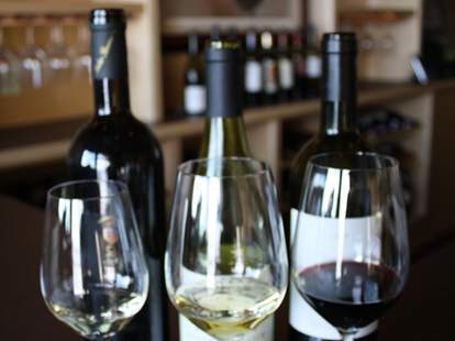 three glasses of wine at Veritas Wine Room Dallas texas