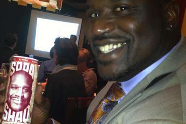 Shaq holding a Soda Shaq