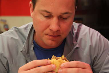 Ryan eating a 7x7 burger at Steak & Shake