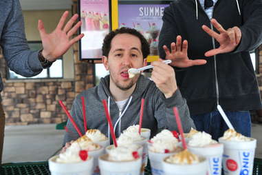 guy eats a peanut butter bacon shake at Sonic