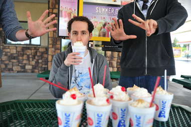 guy eats a banana cream pie milkshake at Sonic