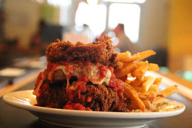 The lasagna bun burger on the counter at PYT in the Piazza at Schmidt's in Northern Liberties.