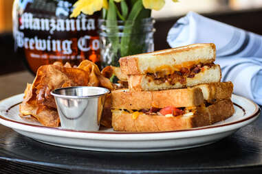 Grilled Cheese Sandwich with bacon, tomato and fried onion at Magnolia Tap and Kitchen in downtown San Diego.
