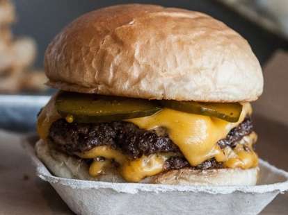 Cheeseburger with pickles and onions at Company Burger New Orleans