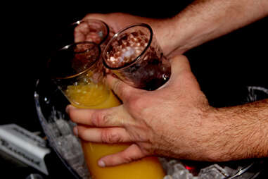 Hands grasping mixers at Haven nightclub at the Golden Nugget in Atlantic City
