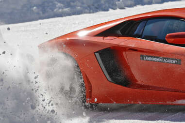 A Lambo showing snow the what for