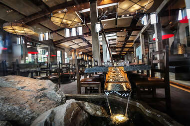 Water flowing thru the table at Stone Brewing World Bistro & Gardens - Liberty Station in San Diego.