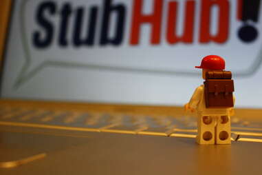 lego person in front of StubHub sign
