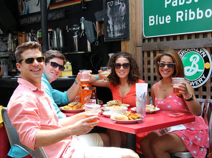 People drinking in the beer garden at Charlie's Kitchen