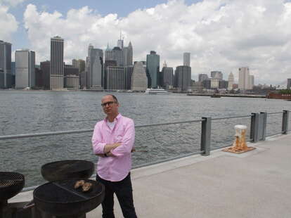 James Oseland grilling In Brooklyn Bridge Park