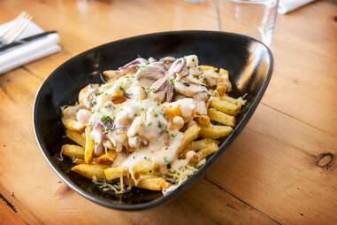 Fish Public - Wash down seafood poutine with cocktails by the bottle ...