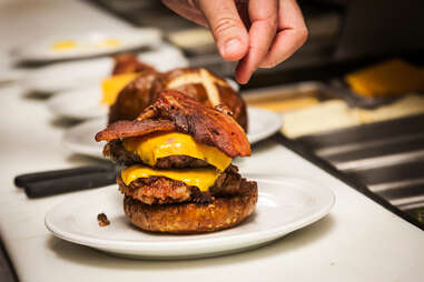 Strip of bacon on the 'Merica Burger at Slater's 50/50 in San Diego.