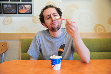 guy eating a Blizzard at Dairy Queen