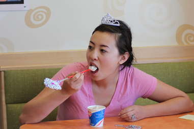 a girl eating a Blizzard