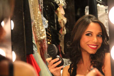 Royal Jelly dancer Alejandra smiles in the mirror backstage at Revel in Atlantic City