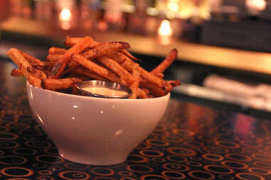 The baked and fried garlic sauced fries at the Tavern on Camac St in Midtown Village