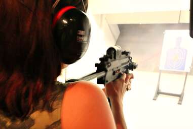  Girl shooting HK MP 4.6 x 30mm at Lock and Load Miami