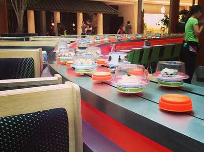 Seating next to the conveyor belt at Wasabi Sushi