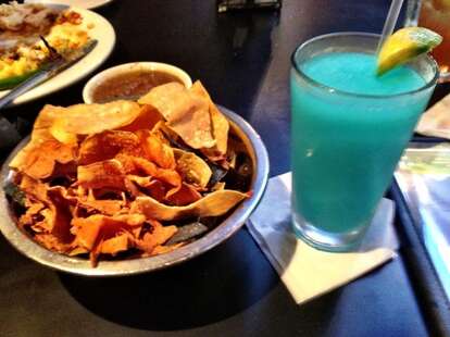 Chips and dip and a blue marg at Blue Mesa