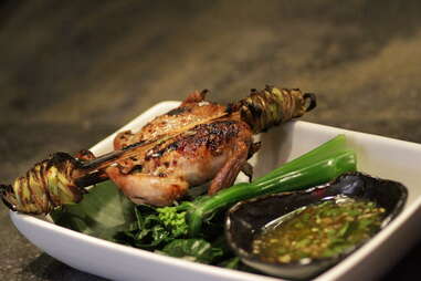 Quail on a stick at Khe-Yo