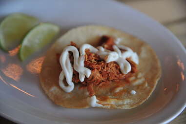 chicken tingas con papas taco at Agave Taco Bar